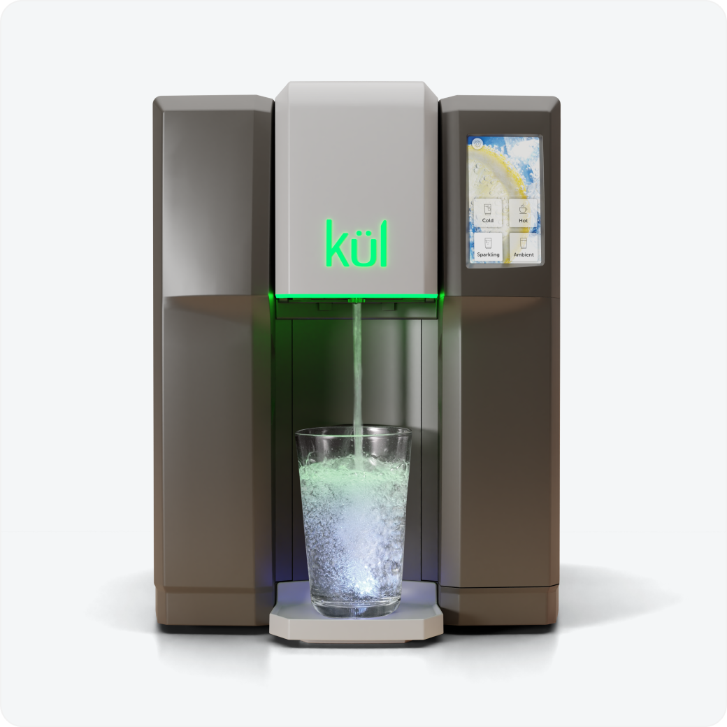 Kul Spark lit green filling glass of carbonated water